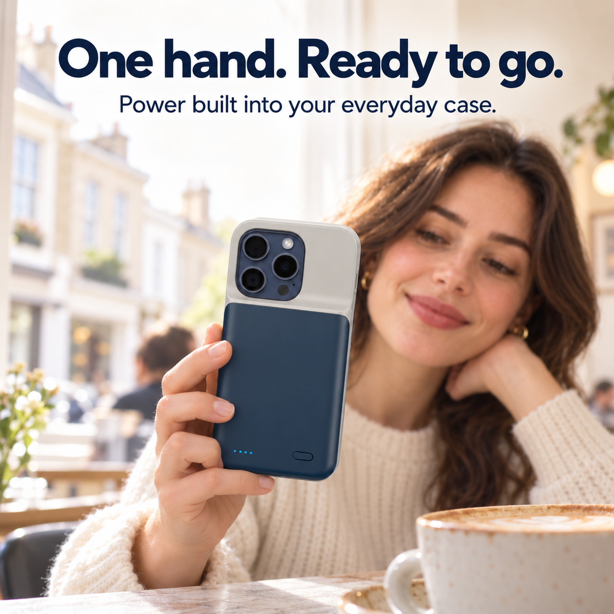 One-handed use of the blue iPhone battery case at a cafe.